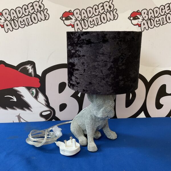 Silver glitter French Bulldog table lamp with black shade.