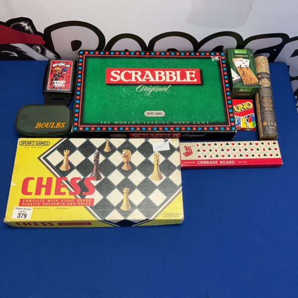 Mixed lot of vintage board games including Scrabble, Uno and boules.