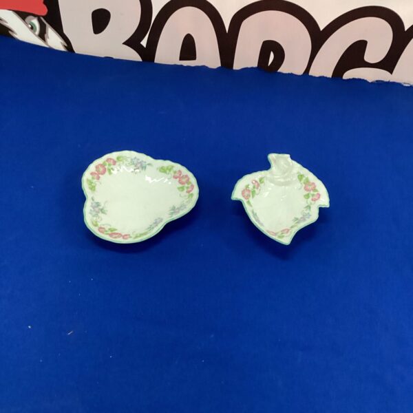 Antique Royal Worcester trinket dishes with floral decoration.