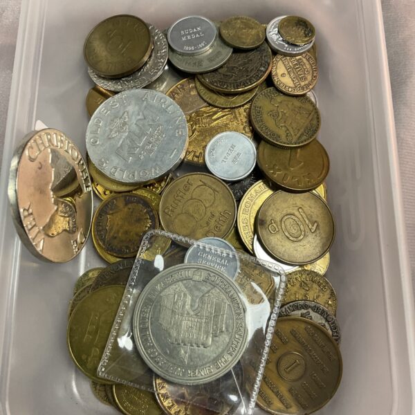 Close-up of an assorted coin lot with vintage currency.