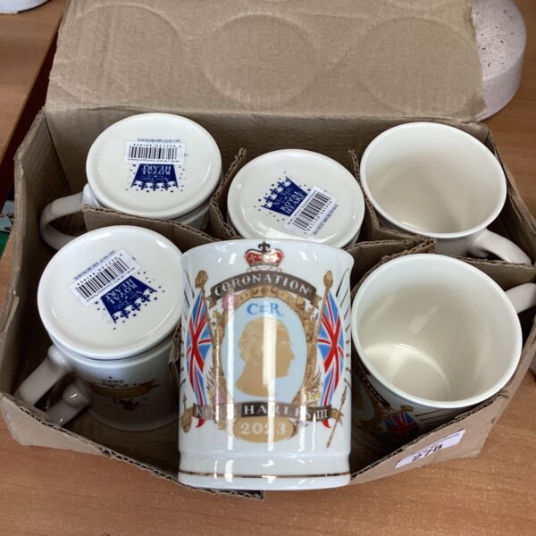 Lot of six King Charles Coronation tankards, royal commemorative ceramics.