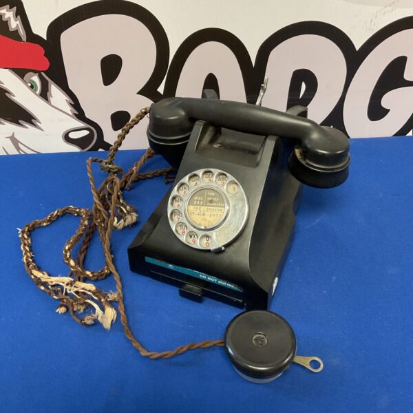 Vintage 1930s Bakelite rotary telephone, black finish.