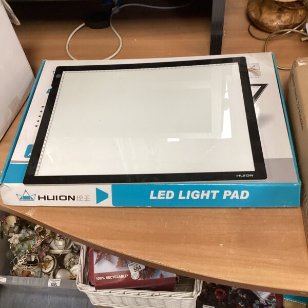 Huion LED light pad for tracing and drawing artwork.