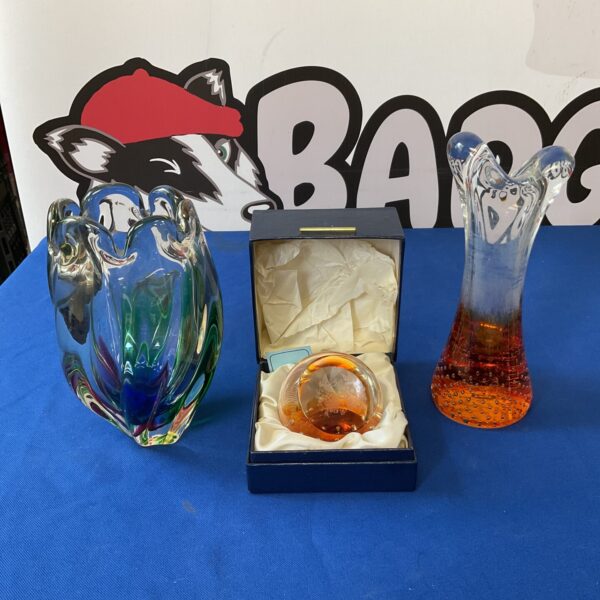 Vibrant Murano art glass vases and Caithness paperweight collection.