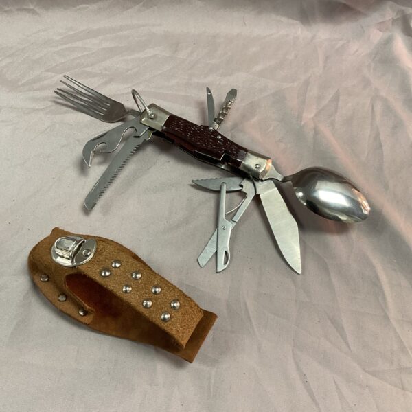 Vintage Japanese multi tool with knife, fork, and spoon.