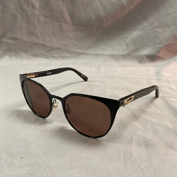 Black Moschino Love sunglasses with cat-eye frames.