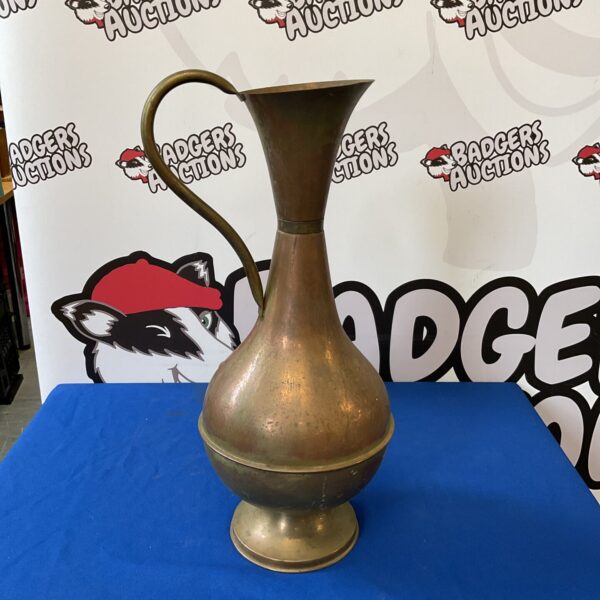 Large vintage copper pitcher with a beautiful patina.
