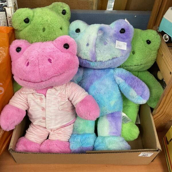 Lot of four Build a Bear frogs, colourful plush toys.