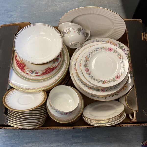 Vintage mixed china tea set with Royal Doulton and Paragon pieces.