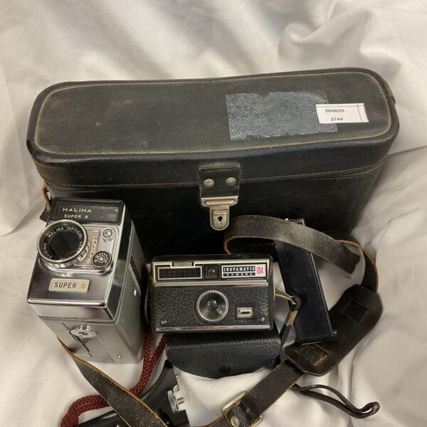 Vintage Halina Super 8 and Instanatic camera in case.