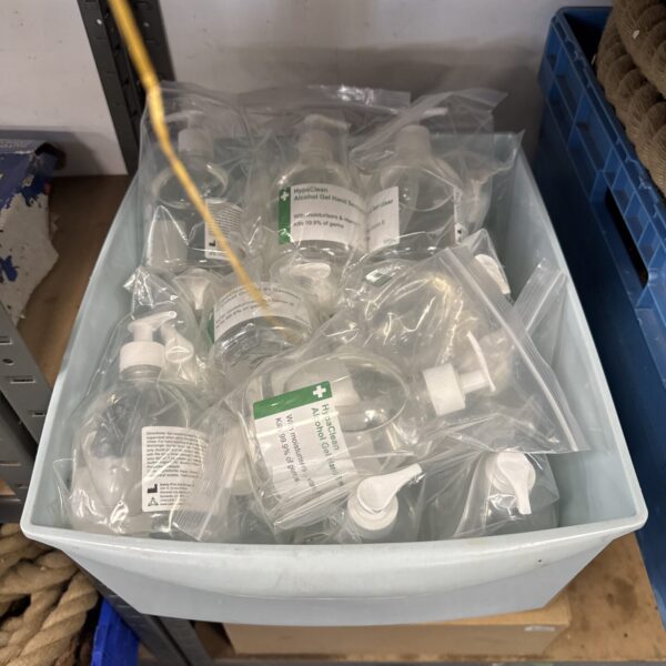 Tray of sealed Hypaclean hand sanitiser bottles for hygiene.
