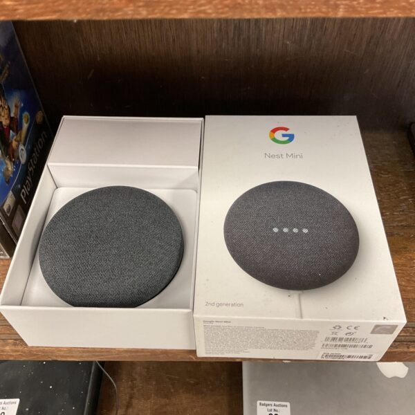 Google Nest Mini 2nd Generation smart speaker in original packaging.