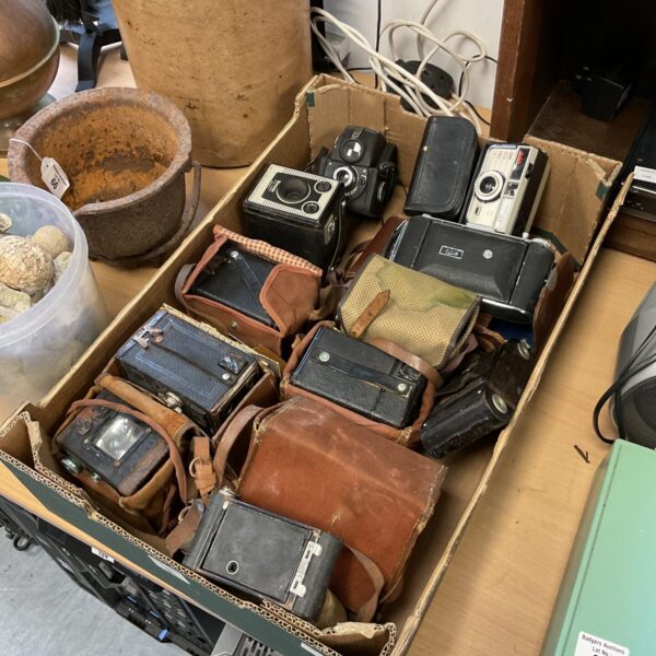Vintage camera lot including Ensign and Kodak models for collectors.