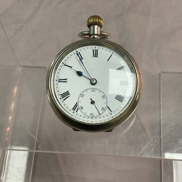 Vintage Buren pocket watch with white dial and Roman numerals.