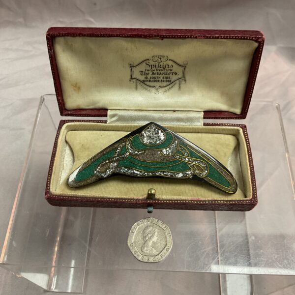 Antique French Art Nouveau brooch with delicate floral enamel detailing.
