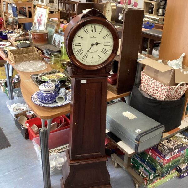 Front view of a vintage Bentima grandmother clock.