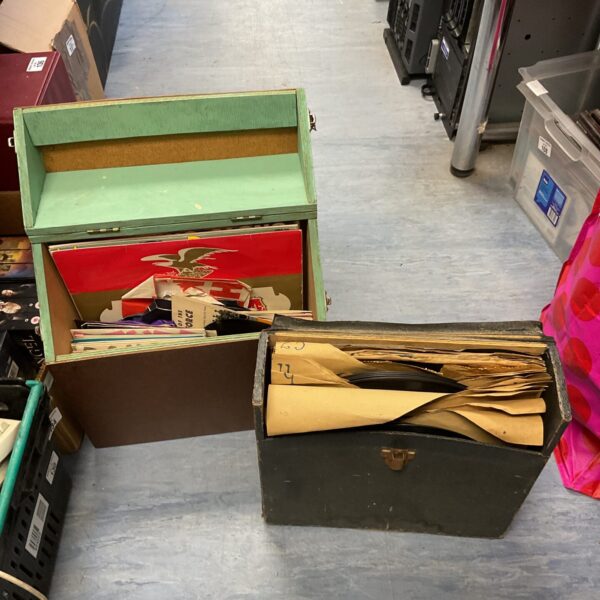 Vintage wooden record cases for vinyl storage and collection.