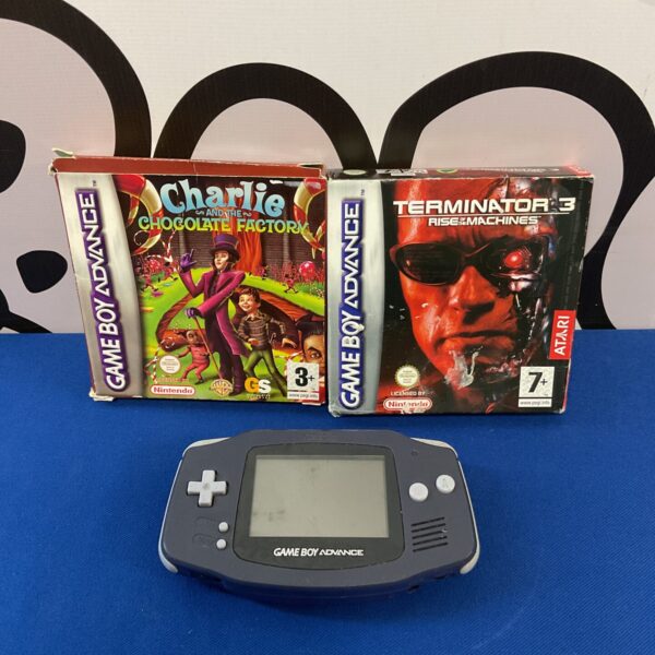 Nintendo Game Boy Advance console with two game cartridges for retro gaming.