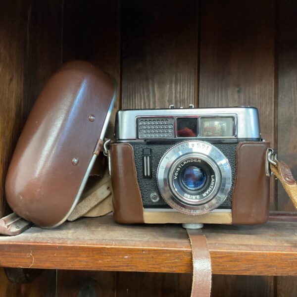 Front view of a vintage Voigtlander Vito CL 35mm film camera.