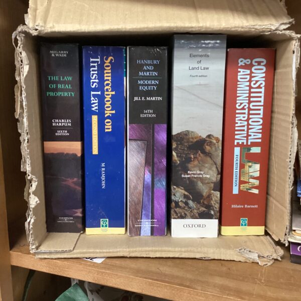Collection of five law books on legal topics.