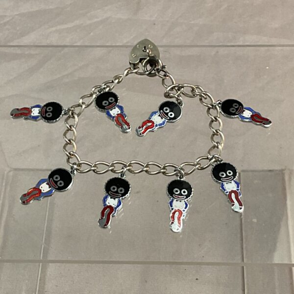 Vintage silver bracelet with eight enamel Robertson golly pendants.