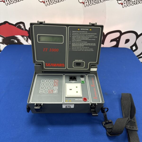 Seaward IT1000 electrical safety tester with leads and instructions.