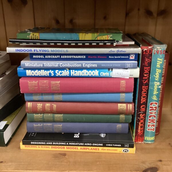 Vintage model aircraft books collection, aviation literature.