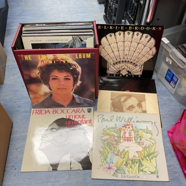 Vintage vinyl record collection with Paula Williams album cover.