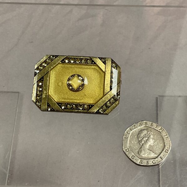Vintage French Art Deco brooch from the 1930s with geometric design.