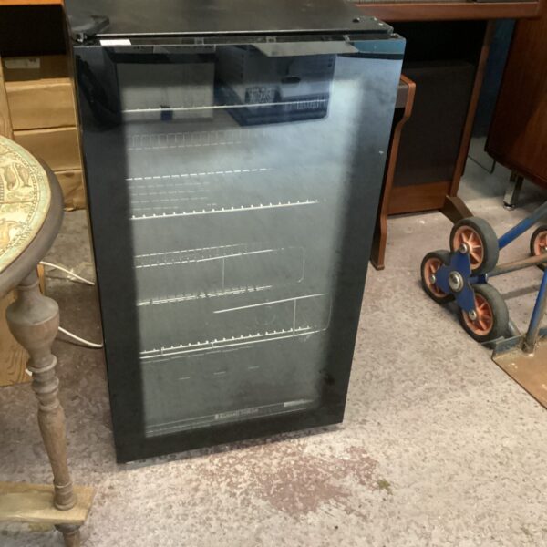 Front view of a black retro wine cooler appliance.