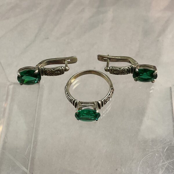 Vintage silver ring and earring set with green stone.