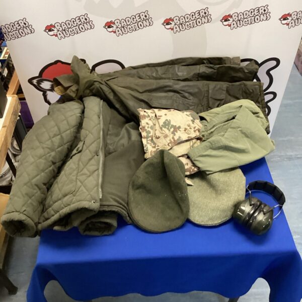 Country estate jacket lot with wax coat and flat caps.