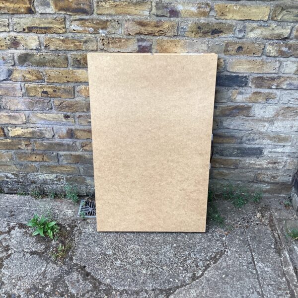Vintage folding paste table showing signs of age and wear.