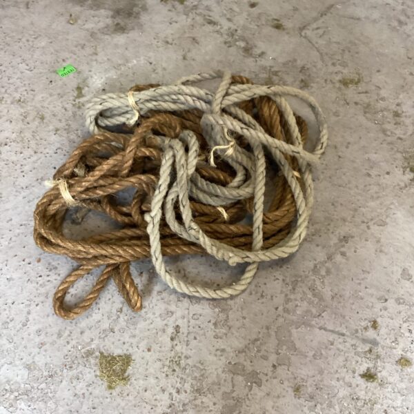 Vintage bundle of rope for crafting and nautical projects.