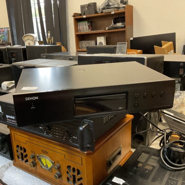 Black Denon dcd-520ae CD player for home audio systems.