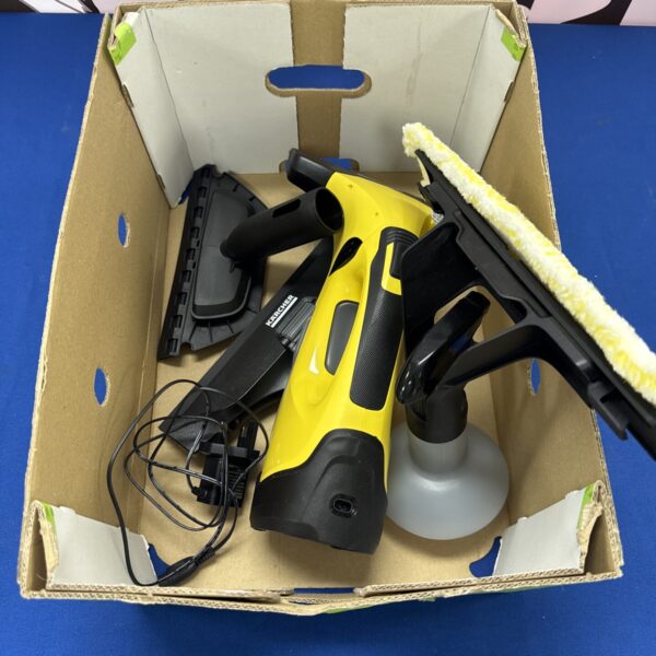 Karcher WV50 window vacuum cleaner with charger and attachments.