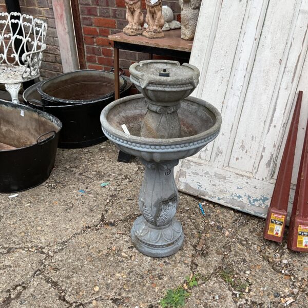 Tiered plastic garden water feature for outdoor use.