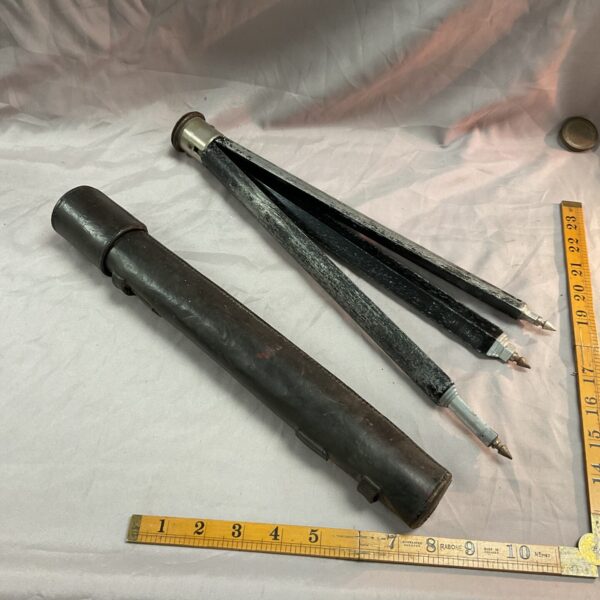 Antique French Brevete tripod in full view, showing wear.