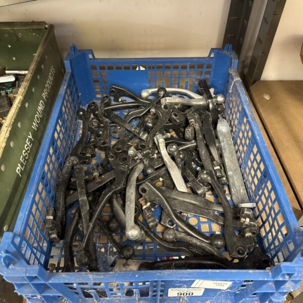 Mixed lot of vintage motorcycle handlebar levers for restoration.