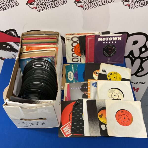 Vintage lot of 7 inch vinyl records for collectors.