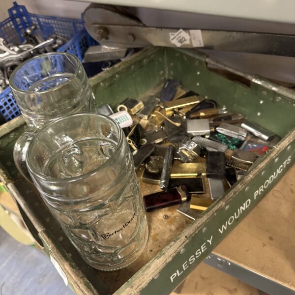 Vintage glass steins and lighters lot for collectors.