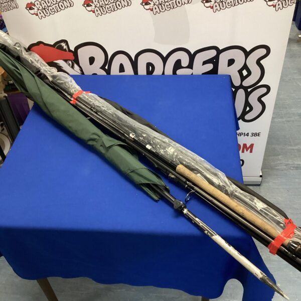 Fishing rods and umbrella lot including Shimano equipment.