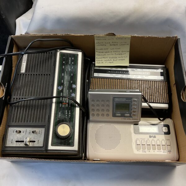 Vintage Silvercrest world receiver portable radio with tuning dial.