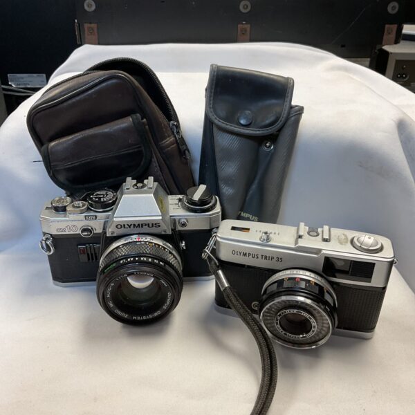 Vintage Olympus OM10 and Trip 35 cameras with case.