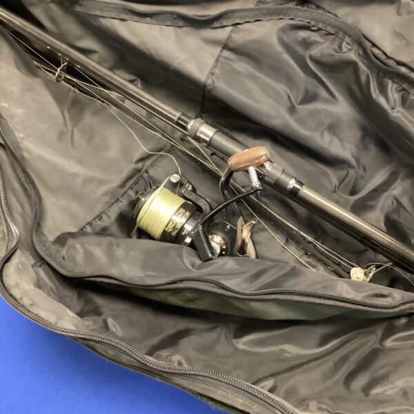 Carp fishing rod and reel set inside a Chub fishing bag.