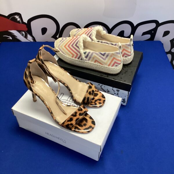 Two pairs of ladies moda shoes, leopard print heels and fiori slip ons.