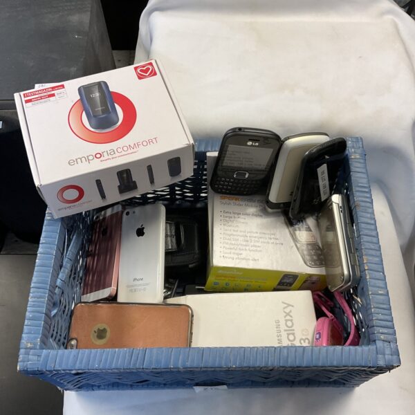 Basket of assorted vintage and modern mobile phones.
