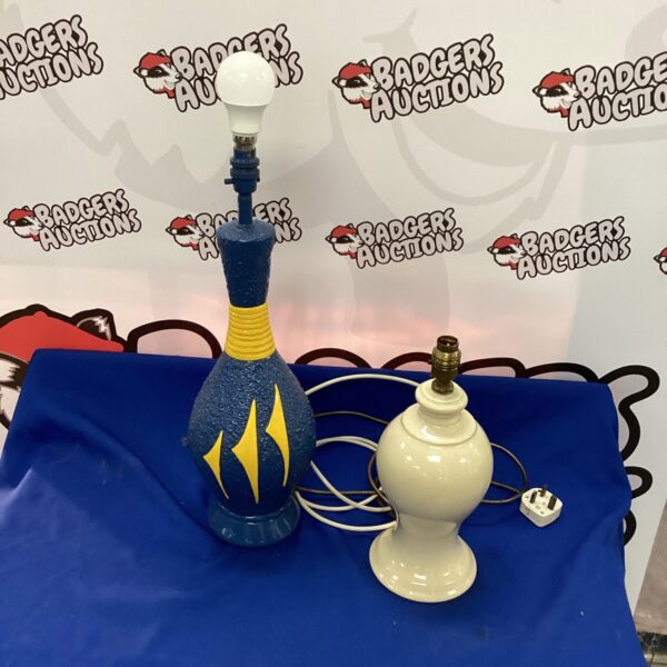 Vintage blue ceramic table lamp with retro design.