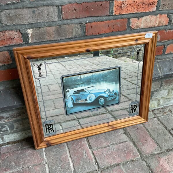 Vintage mirror depicting a 1928 Rolls Royce Springfield Phantom I.