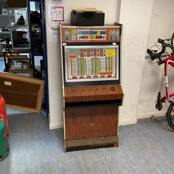 Vintage JPM fruit machine in used condition, a classic arcade game.